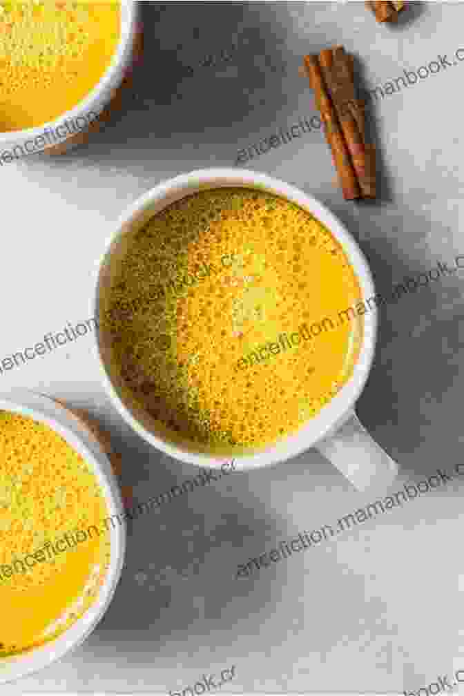 A Steaming Cup Of Turmeric Golden Milk With A Sprinkling Of Cinnamon On Top Turmeric Drink Recipes For Optimum Health: Smoothies Juice Tea And Much More