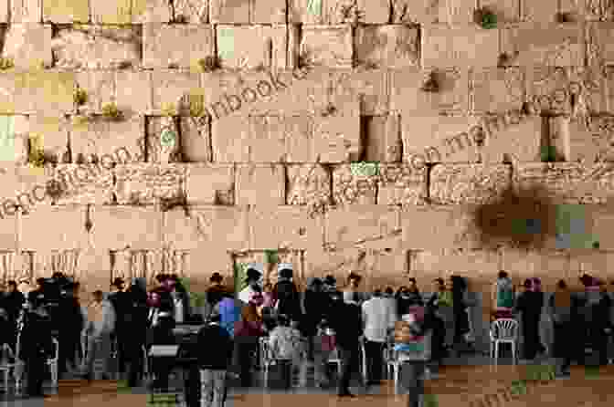 Anahita Stands Before The Western Wall In Jerusalem, Her Eyes Closed In Prayer. Fate Of Devotion (Finding Paradise 2)