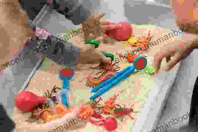Children Playing In A Sensory Bin Filled With Different Textures Play Learn Toddler Activities Book: 200+ Fun Activities For Early Learning